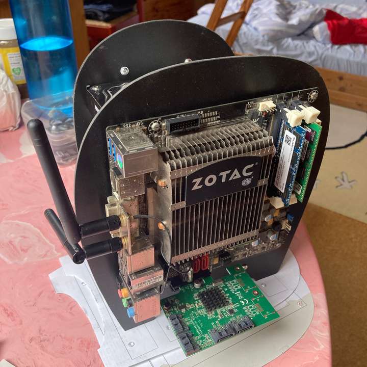 Front view of the server components mounted between the new plates, still without cables