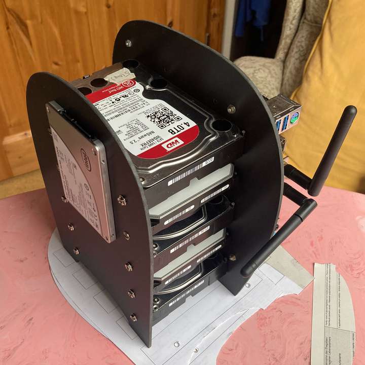 Back view of the server components mounted between the new plates, still without cables